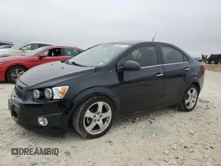 2012 Chevrolet Sonic LTZ z VIN 1G1JE5SB2C4173638, wystawiony jako Copart lot #84634474 z przebiegiem 148 247 mil mil oraz Szkoda całkowita • Salvage title. Historia ofert i sprzedaży dostępna na DreamBid. Obrazek 1.