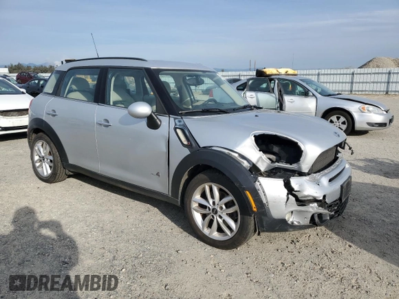 2012 MINI Countryman S with VIN WMWZC5C54CWL59076, listed as a Copart auction lot 48201505 with 172,253 mi miles and Salvage Title. Bid and sale history available at DreamBid. Image 4.