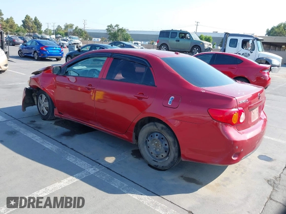 2009 Toyota Corolla with VIN 1NXBU40E99Z089505, listed as a IAAI auction lot 39832879 with 197,912 mi miles. Bid and sale history available at carsss.com. Image 3.
