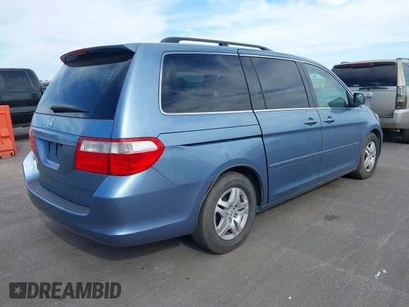 2007 Honda Odyssey EX-L z VIN 5FNRL38757B121989, wystawiony jako IAAI lot #42323131 z przebiegiem 174 906 mil mil oraz . Historia ofert i sprzedaży dostępna na DreamBid. Obrazek 4.