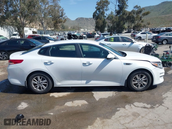 2016 Kia Optima LX with VIN 5XXGT4L3XGG054286, listed as a IAAI auction lot 41924937 with 146,555 mi miles. Bid and sale history available at carsss.com. Image 13.