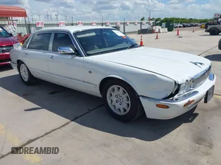 1998 Jaguar XJ Vanden Plas with VIN SAJKX6244WC842758, listed as a IAAI auction lot 42591587 with 206,724 mi miles and . Bid and sale history available at DreamBid. Image 1.