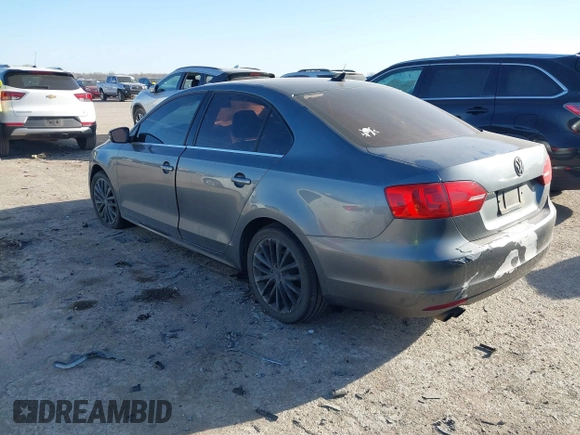 2012 Volkswagen Jetta SEL z VIN 3VWLP7AJ2CM418230, wystawiony jako IAAI lot #41792896 z przebiegiem 220 036 mil mil oraz . Historia ofert i sprzedaży dostępna na DreamBid. Obrazek 3.