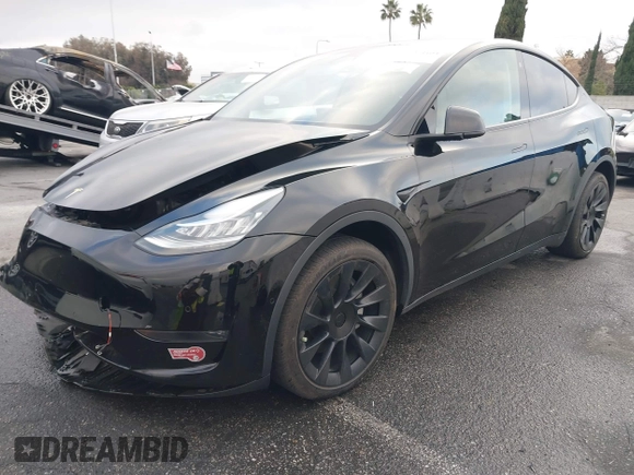 2023 Tesla Model Y Long Range with VIN 7SAYGDEE2PA024032, listed as a IAAI auction lot 41213403 with 23,418 mi miles and . Bid and sale history available at DreamBid. Image 19.