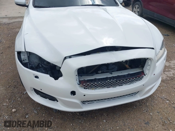 2014 Jaguar XJ R with VIN SAJWA1EK3EMV58692, listed as a IAAI auction lot 42663979 with 111,386 mi miles and . Bid and sale history available at DreamBid. Image 6.