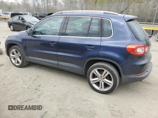 2011 Volkswagen Tiguan SE with VIN WVGBV7AX8BW523969, listed as a Copart auction lot 52463575 with 142,209 mi miles and Clean Title. Bid and sale history available at DreamBid. Image 2.