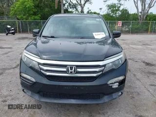 2017 Honda Pilot EX-L with VIN 5FNYF6H50HB033968, listed as a IAAI auction lot 42400720 with 119,597 mi miles and . Bid and sale history available at DreamBid. Image 12.
