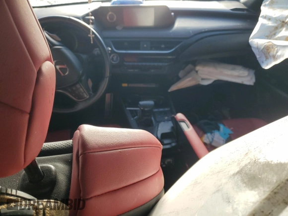 2020 Lexus UX 250h F Sport z VIN JTHE9JBHXL2033485, wystawiony jako Copart lot #86924894 z przebiegiem Nie podano mil oraz Szkoda całkowita • Salvage title. Historia ofert i sprzedaży dostępna na DreamBid. Obrazek 8.