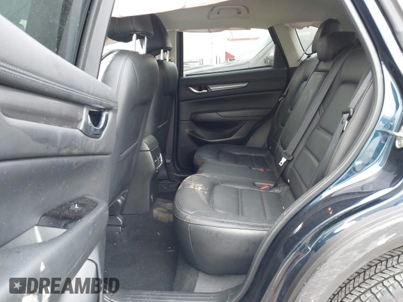 2023 Mazda CX-5 S Carbon Edition z VIN JM3KFBCM4P0288155, wystawiony jako IAAI lot #41501030 z przebiegiem 26 516 mil mil oraz . Historia ofert i sprzedaży dostępna na DreamBid. Obrazek 8.
