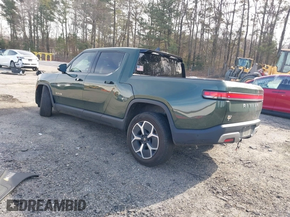 2022 Rivian R1T Adventure z VIN 7FCTGAAA8NN015369, wystawiony jako IAAI lot #41407842 z przebiegiem 22 507 mil mil oraz . Historia ofert i sprzedaży dostępna na DreamBid. Obrazek 3.