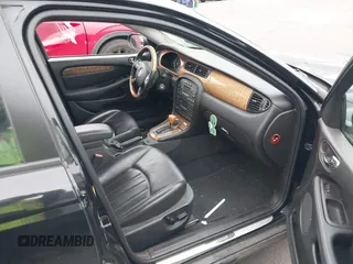2006 Jaguar X-Type with VIN SAJWA51A16WE68650, listed as a IAAI auction lot 41461291 with 135,332 mi miles and . Bid and sale history available at DreamBid. Image 5.