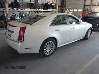 2010 Cadillac CTS Premium with VIN 1G6DS5EV8A0142811, listed as a IAAI auction lot 42562666 with 177,963 mi miles and . Bid and sale history available at DreamBid. Image 4.
