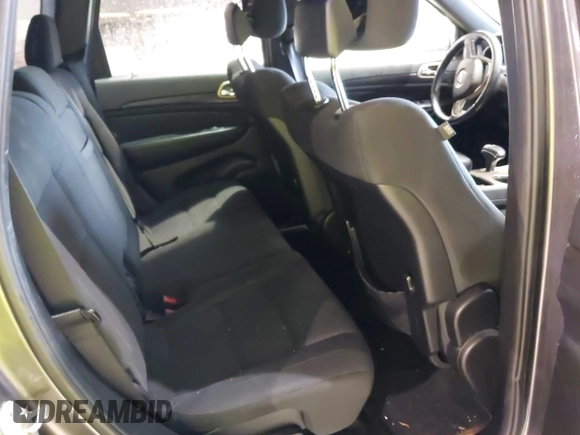 2014 Jeep Grand Cherokee Laredo with VIN 1C4RJEAG7EC145023, listed as a IAAI auction lot 40518825 with 115,098 mi miles and . Bid and sale history available at DreamBid. Image 8.