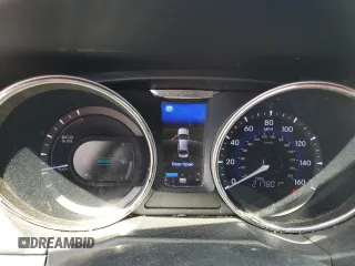 2012 Hyundai Sonata Hybrid z VIN KMHEC4A43CA059186, wystawiony jako Copart lot #55575405 z przebiegiem 217 801 mil mil oraz Szkoda całkowita • Salvage title. Historia ofert i sprzedaży dostępna na DreamBid. Obrazek 9.