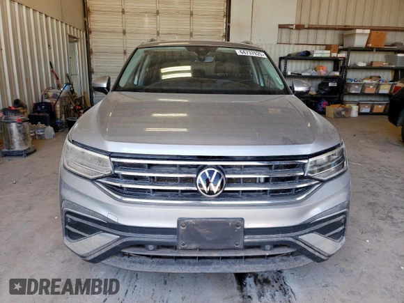 2023 Volkswagen Tiguan SE с VIN 3VVNB7AX6PM014952, выставлен на аукционе Copart как лот 64737925 с пробегом Не указан миль и Списание • Salvage title. История ставок и продаж доступна на DreamBid. Изображение 5.