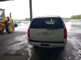 2014 Chevrolet Suburban LT with VIN 1GNSCJE05ER153658, listed as a IAAI auction lot 41867781 with 252,098 mi miles. Bid and sale history available at carsss.com. Image 16.