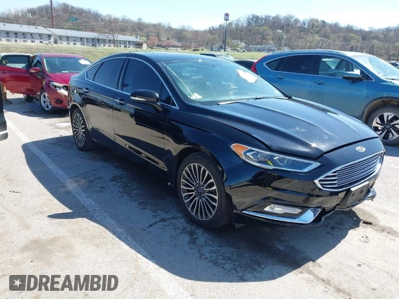 2017 Ford Fusion SE z VIN 3FA6P0HD1HR138693, wystawiony jako IAAI lot #41837634 z przebiegiem 117 638 mil mil oraz . Historia ofert i sprzedaży dostępna na DreamBid. Obrazek 1.
