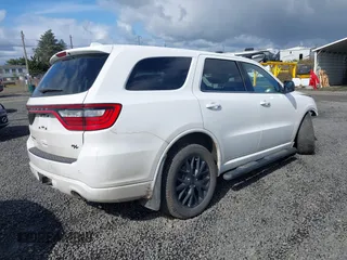 2016 Dodge Durango R/T with VIN 1C4SDJCT3GC315487, listed as a IAAI auction lot 41939604 with 123,480 mi miles and . Bid and sale history available at DreamBid. Image 4.