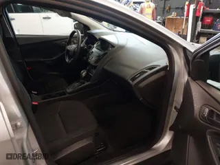 2016 Ford Focus S with VIN 1FADP3E22GL390039, listed as a IAAI auction lot 41958137 with 83,411 mi miles. Bid and sale history available at carsss.com. Image 5.