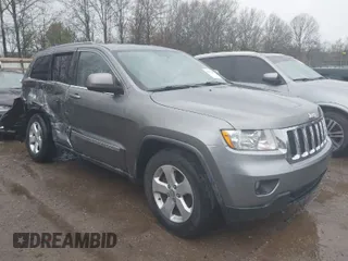 2012 Jeep Grand Cherokee Laredo with VIN 1C4RJFAG0CC156545, listed as a IAAI auction lot 41909296 with 170,033 mi miles. Bid and sale history available at carsss.com. Image 1.