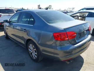 2013 Volkswagen Jetta SE with VIN 3VWDP7AJ8DM436818, listed as a IAAI auction lot 42386196 with 121,043 mi miles and . Bid and sale history available at DreamBid. Image 3.