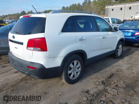 2012 Kia Sorento LX with VIN 5XYKT4A2XCG242557, listed as a IAAI auction lot 41802774 with 117,993 mi miles. Bid and sale history available at carsss.com. Image 4.