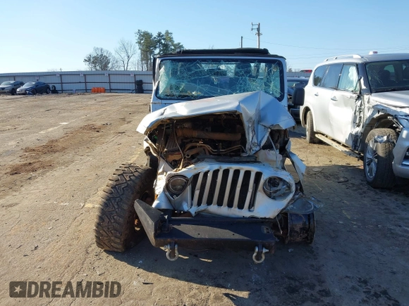 2006 Jeep Wrangler Unlimited LWB with VIN 1J4FA44S76P755148, listed as a IAAI auction lot 41774840 with 167,914 mi miles. Bid and sale history available at carsss.com. Image 12.