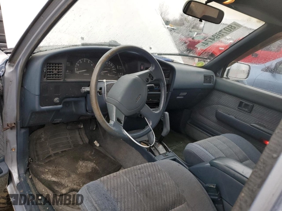 1991 Toyota Pickup DLX z VIN JT4VN13GXM5041525, wystawiony jako Copart lot #80709474 z przebiegiem 309 094 mil mil oraz Szkoda całkowita • Salvage title. Historia ofert i sprzedaży dostępna na DreamBid. Obrazek 8.