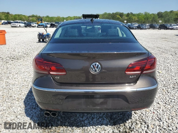 2013 Volkswagen CC Sport Plus z VIN WVWBP7AN7DE515951, wystawiony jako Copart lot #52251575 z przebiegiem 121 414 mil mil oraz Szkody całkowita. Historia ofert i sprzedaży dostępna na DreamBid. Obrazek 6.