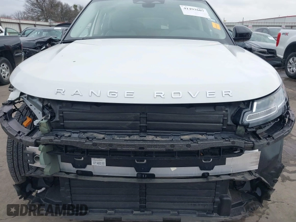 2023 Land Rover Range Rover Evoque S z VIN SALZJ2FX1PH206131, wystawiony jako IAAI lot #41492607 z przebiegiem 15 936 mil mil oraz . Historia ofert i sprzedaży dostępna na DreamBid. Obrazek 13.
