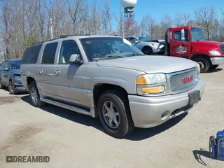 2004 GMC Yukon XL Denali with VIN 1GKFK66U44J290751, listed as a IAAI auction lot 41910612 with 275,000 mi miles. Bid and sale history available at carsss.com. Image 1.
