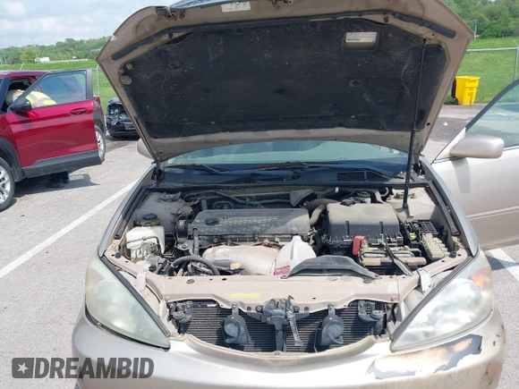 2003 Toyota Camry LE with VIN 4T1BE32K13U243738, listed as a IAAI auction lot 42120647 with Not Provided miles and . Bid and sale history available at DreamBid. Image 10.