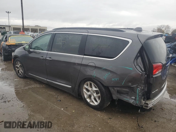 2017 Chrysler Pacifica Touring L with VIN 2C4RC1BG4HR810277, listed as a Copart auction lot 77885014 with 101,492 mi miles and Salvage Title. Bid and sale history available at DreamBid. Image 2.