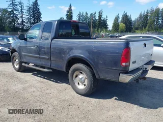2001 Ford F-150 XL with VIN 1FTRX18L11NA30541, listed as a IAAI auction lot 42143117 with 187,855 mi miles. Bid and sale history available at carsss.com. Image 3.