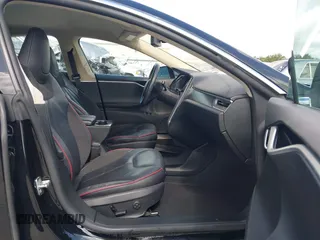 2014 Tesla Model S 60 с VIN 5YJSA1H17EFP41957, выставлен на аукционе IAAI как лот 42448795 с пробегом 103 990 миль миль и . История ставок и продаж доступна на DreamBid. Изображение 5.
