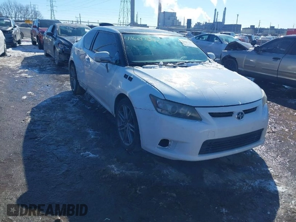 2012 Scion tC with VIN JTKJF5C70C3031365, listed as a IAAI auction lot 41607290 with 241,183 mi miles. Bid and sale history available at carsss.com. Image 1.