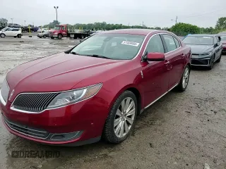 2013 Lincoln MKS EcoBoost with VIN 1LNHL9FTXDG606799, listed as a Copart auction lot 57469995 with 80,168 mi miles and Salvage title. Bid and sale history available at DreamBid. Image 14.