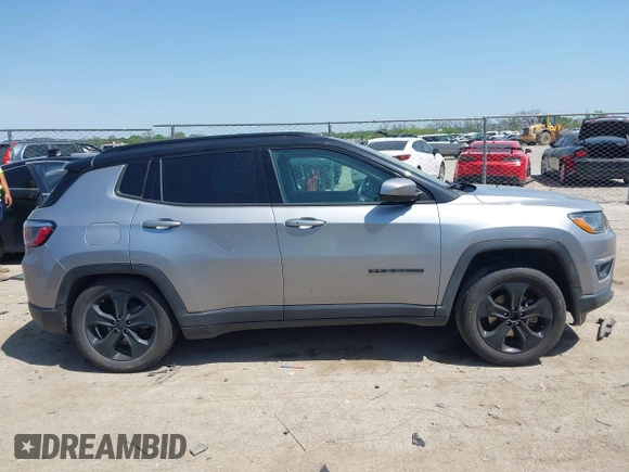 2018 Jeep Compass Latitude with VIN 3C4NJDBB3JT304145, listed as a IAAI auction lot 42008241 with 52,642 mi miles and . Bid and sale history available at DreamBid. Image 13.