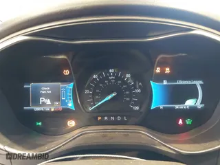 2016 Ford Fusion Titanium Hybrid with VIN 3FA6P0RU7GR127307, listed as a IAAI auction lot 41944427 with 128,076 mi miles. Bid and sale history available at carsss.com. Image 7.