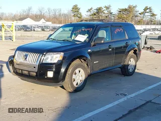 2008 Mercury Mariner with VIN 4M2CU81168KJ26462, listed as a IAAI auction lot 41454643 with 214,873 mi miles and . Bid and sale history available at DreamBid. Image 2.