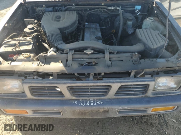 1996 Nissan Frontier XE z VIN 1N6SD11Y1TC316952, wystawiony jako Copart lot #79935534 z przebiegiem 254 022 mil mil oraz Czysty tytuł • Clean title. Historia ofert i sprzedaży dostępna na DreamBid. Obrazek 11.