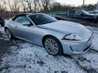 2010 Jaguar XK with VIN SAJWA4GB7ALB35518, listed as a Copart auction lot 86475814 with 32,910 mi miles and Salvage Title. Bid and sale history available at carsss.com. Image 4.