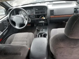 1998 Jeep Grand Cherokee Laredo with VIN 1J4GZ58SXWC144437, listed as a Copart auction lot 60437094 with 183,908 mi miles and Salvage Title. Bid and sale history available at carsss.com. Image 8.
