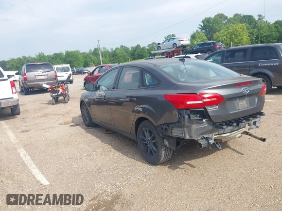 2018 Ford Focus SE with VIN 1FADP3F29JL288761, listed as a IAAI auction lot 42290510 with 93,463 mi miles and . Bid and sale history available at DreamBid. Image 3.