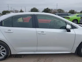 2024 Toyota Corolla Hybrid LE with VIN JTDBCMFE4R3045299, listed as a IAAI auction lot 41283042 with 13,649 mi miles. Bid and sale history available at carsss.com. Image 14.