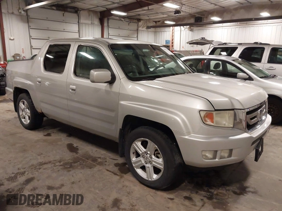 2009 Honda Ridgeline RTL with VIN 2HJYK16519H000129, listed as a IAAI auction lot 41891810 with 186,124 mi miles. Bid and sale history available at carsss.com. Image 1.