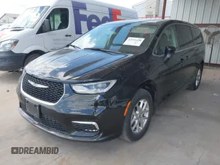 2023 Chrysler Pacifica Touring L with VIN 2C4RC1BG1PR550628, listed as a IAAI auction lot 42553430 with 61,773 mi miles and . Bid and sale history available at DreamBid. Image 23.