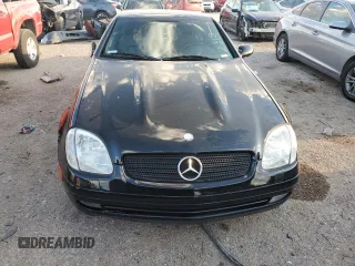 1999 Mercedes-Benz SLK-Class with VIN WDBKK47F1XF124854, listed as a Copart auction lot 73160604 with 55,730 mi miles and Salvage Title. Bid and sale history available at carsss.com. Image 5.