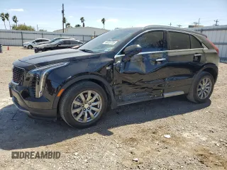 2020 Cadillac XT4 FWD Premium Luxury with VIN 1GYFZCR49LF138364, listed as a Copart auction lot 49223705 with 40,428 mi miles and Salvage Title. Bid and sale history available at carsss.com. Image 1.