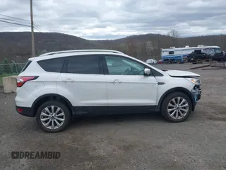 2018 Ford Escape Titanium with VIN 1FMCU9J90JUD53380, listed as a IAAI auction lot 42042802 with 30,371 mi miles and . Bid and sale history available at DreamBid. Image 14.